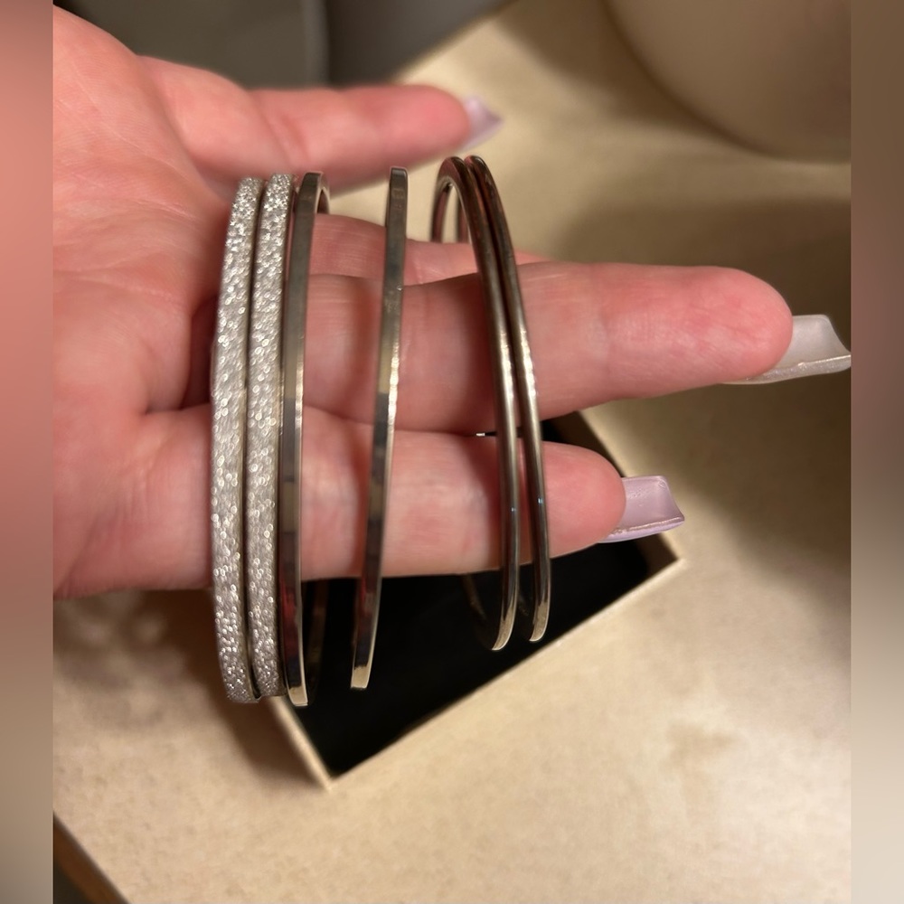 3 pairs of silver hoops-1 sparkles more-med size